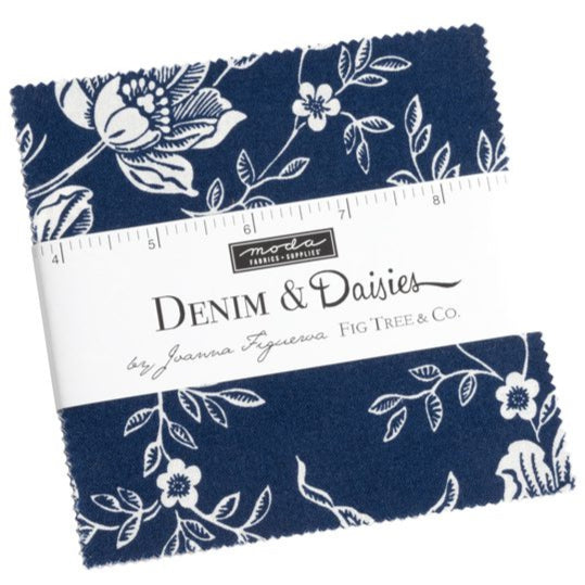 Fabric bundle of 42 5-inch squares of the collection Denim & Daisies by Fig Tree for Moda. Available to buy in store and online at Fabric Focus Edinburgh.