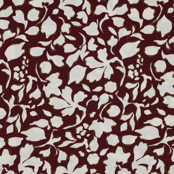 A beautiful simple retro floral print of ivory and tan on a wine background, on a soft viscose fabric with just a touch of elastane. Perfect for wrap dresses, wide legged trousers and blouses.  Sold in half metre increments at Fabric Focus Edinburgh.
