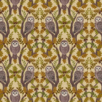 Patterned fabric with owls and leaves on a beige background
