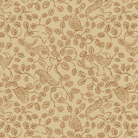 Patterned cotton with owls and foxes and leaves on a beige background