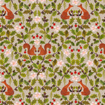 Patterned fabric with foxes, squirrels, oak leaves, and berries on a beige background