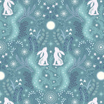 Pattern of white rabbits and floral elements on a teal background