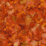 Beautiful bright marbled print with metallic detail throughout. This being orange colourway. Available to buy in quarter metre increments at Fabric Focus.