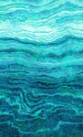 Stonehenge Ombre with a progression of colour from light to dark across the width in the turquoise Peacock colourway. Sold at Fabric Focus Edinburgh