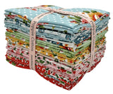 Stack of colorful fabric bundles tied with a ribbon on a white background