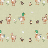 Printed cotton fabric, featuring cute, farmyard animals, this being the Mallard Family. Available to buy in quarter metre increments at Fabric Focus.