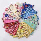 Collection of colorful fabric swatches with various patterns on a white background