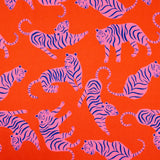 Gorgeous viscose lawn of pink tigers on an orange background from Fabric Godmother and available at Fabric Focus Edinburgh.