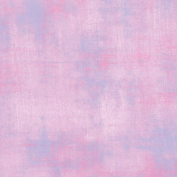 A bright, lilac Lupine grunge print. Grunge Basics from Moda Fabrics is one of our favorite blenders ever! Grunge is great for adding that little extra something to a quilt, like texture and depth.  Available in quarter metre increments at Fabric Focus.
