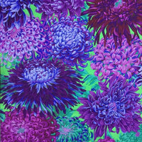 Colorful floral pattern with purple and green flowers on a multicolored background