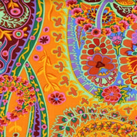 Colorful paisley pattern with vibrant orange, pink, and green colors.