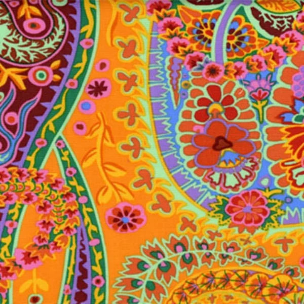 Colorful paisley pattern with vibrant orange, pink, and green colors.