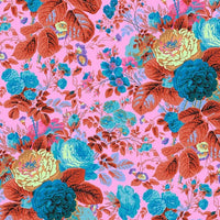 Colorful floral pattern of teal and red on a pink background
