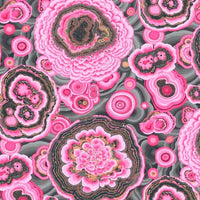 Pattern of pink and gray geode-like shapes on a matching background