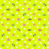 Pattern of colorful fish on a green background with white polka dots