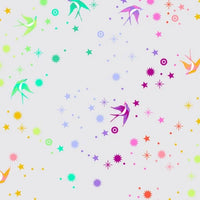 EXTRA WIDE Fairy Dust by Tula Pink has a rainbow ombre of birds and stars over the palest of pale greys. Sold in half metre increments at Fabric Focus.
