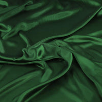 Gorgeous viscose satin in gorgeous emerald green shade from Fabric Godmother and available at Fabric Focus.