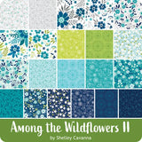 A grid of floral and botanical pattern swatches in blue, teal, green, and navy tones, with a green banner at the bottom reading 'Among the Wildflowers II by Shelley Cavanna'.