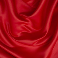 Duchess Satin fabric is a highly lustrous, smooth, very finely woven heavy non stretch satin. It has a very subtle sheen that is classic and elegant and very different in appearance to most satins which generally have a high gloss finish. This is the classic Scarlet Red. Sold in half meter lengths at Fabric Focus.