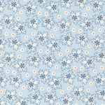 Denim & Daisies white ditzy floral  with orange accent on a blue background from Fig Tree Co for Moda. Sold in quarter metre increments.