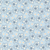 Denim & Daisies white ditzy floral  with orange accent on a blue background from Fig Tree Co for Moda. Sold in quarter metre increments.