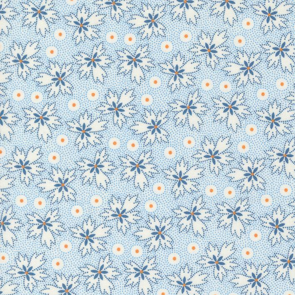 Denim & Daisies white ditzy floral  with orange accent on a blue background from Fig Tree Co for Moda. Sold in quarter metre increments.