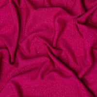 'Dazzle' Jersey is a soft handle, slinky jersey, perfect for dresses skirts and tops. Covered in a fine glitter! Stunning and easy to sew  This being the vibrant Fuchsia. Available to buy in half metre increments.