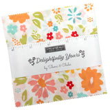 Pack of floral fabric squares with a ruler for scale, branded 'Delightfully Yours' by Sherri & Chelsie.