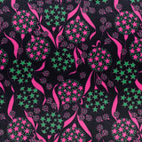 Gorgeous viscose satin print of stars and ribbons in emerald and pink on a midnight background from Fabric Godmother and available at Fabric Focus Edinburgh.