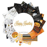 A circular arrangement of Halloween-themed fabric squares around a white center label reading 'Happy Haunting' by Leslie Trimback. The fabrics feature black spiderwebs, orange pumpkins, plaid patterns, bats, ghosts, and spooky text on a white background.