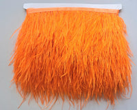 Super Luxurious Ostrich Feather trim, coloured and on co-ordinating coloured ribbon. A zingy orange colourway.  Sold in metre increments