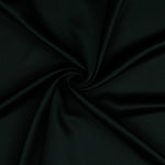 A beautiful soft polyester satin that has a subtle sateen sheen rather than a high gloss finish usually associated with satins. Because of this it has a high-end expensive look. Perfect for evening wear and day wear alike! This being the classic black colourway.  Sold in half meter lengths at Fabric Focus.