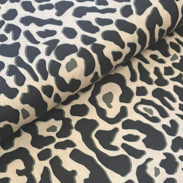 Gorgeous viscose twill of black and grey animal print on a cream background and available at Fabric Focus Edinburgh