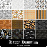A collage of 16 Halloween-themed fabric or wallpaper pattern swatches arranged in a grid, with a black banner at the bottom reading 'Happy Haunting by Leslie Trimbach.' The designs include ghosts, pumpkins, bats, crows, stripes, plaid, and spooky text motifs in black, white, gray, orange, and brown tones.