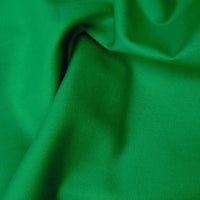 cotton poplin. emerald green. Fabric Focus