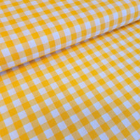 100% yarn dyed cotton gingham. yellow. Fabric Focus