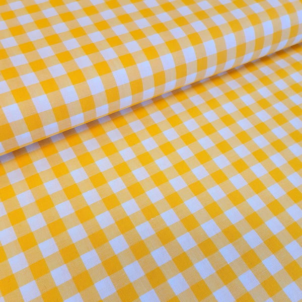 100% yarn dyed cotton gingham. yellow. Fabric Focus
