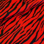 polyester jersey print. zebra. red. Fabric Focus