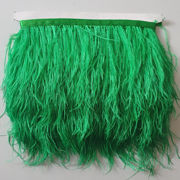 Ostrich feather trim in a stunning emerald green colourway. Available to buy in store and online at Fabric Focus Edinburgh.