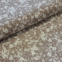 A beautiful classic stone background with cream floral shapes on a viscose challis fabric. perfect for wrap dresses, wide legged trousers and blouses. Sold in half metre increments.