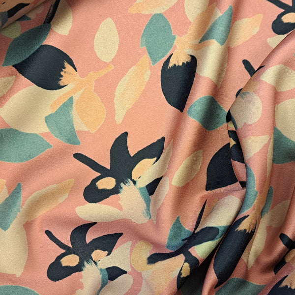 Pink with black, gold, green and cream floral motifs make up this beautiful soft crepe with amazing drape and a slight stretch!