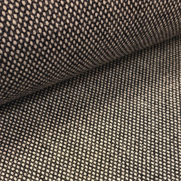 This beautiful quality wool mix tweed suiting is a classic in a stunning grey colour-way that almost looks like a honey-comb weave. It has a lovely weight and texture and would be ideal for making jackets, skirts and dresses.