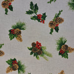 Small bunches of Christmas Holly and greenery over a neutral background.  A printed half panama European produced fabric, it is Cotton Rich and is also referred to as a canvas by some. Widely used for Bag Making, Apparel and Crafting. Available in half metre increments at Fabric Focus.