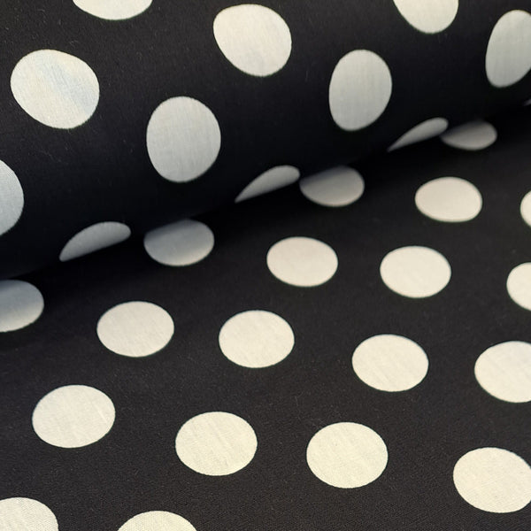 This is one of the classic fashion looks, bold large spots in the ever classic combination of black and white! Stunning for Spring Summer dresses!  Sold in half metre increments at Fabric Focus.