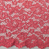 Corded Lace is an exquisite corded lace fabric with a pretty scallop along both edges. Will be perfect to make a statement piece for a special occasion this being the exotic coral colourway. It is slight 'heavier' and more open that the 'Tocca' laces. Available to buy in half metre increments.