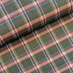 Hard wearing because of the blend between polyester and viscose.  Machine washable and crease resistant - suitable for clothing, kilts, trousers and suits and also for interior products such as curtains and cushions. This classic grey/pink check also has a small percentage of elastane for a forgiving fit. Sold in half metre increments at Fabric Focus.