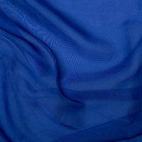 Cationic chiffon is beautifully soft and flowing fabric. Many of the colours in this range have a two tone weave which show different shades when viewed at different angles. Cationic Chiffon drapes beautifully and is used in bridal and evening designs. Available to buy in half metre increments.