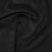 washed jumbo corduroy in black with a 4.5 wale. Available to buy in store and online at Fabric Focus.