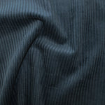 Lustrous and soft, Corduroy is also extremely durable and can be used in dressmaking, for soft furnishings and toys and even for upholstery. This is approximately a 4.5 wale. And comes in many wearable colours, this being a rich dark teal. Available to buy online in half metre increments.