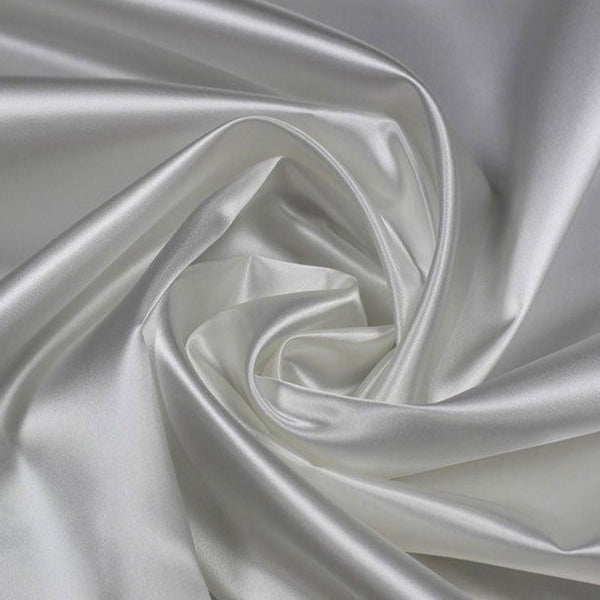 A great satin for evening wear or as a luxurious lining to a coat or jacket. Comes in various beautiful shades. This being the pale ivory. Dry Clean Only NOTE - This fabric will mark if in contact with water Use a dry iron when pressing Available to buy online in half metre increments at Fabric Focus Edinburgh.
